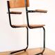 Desk with bauhaus style tubular steel chair