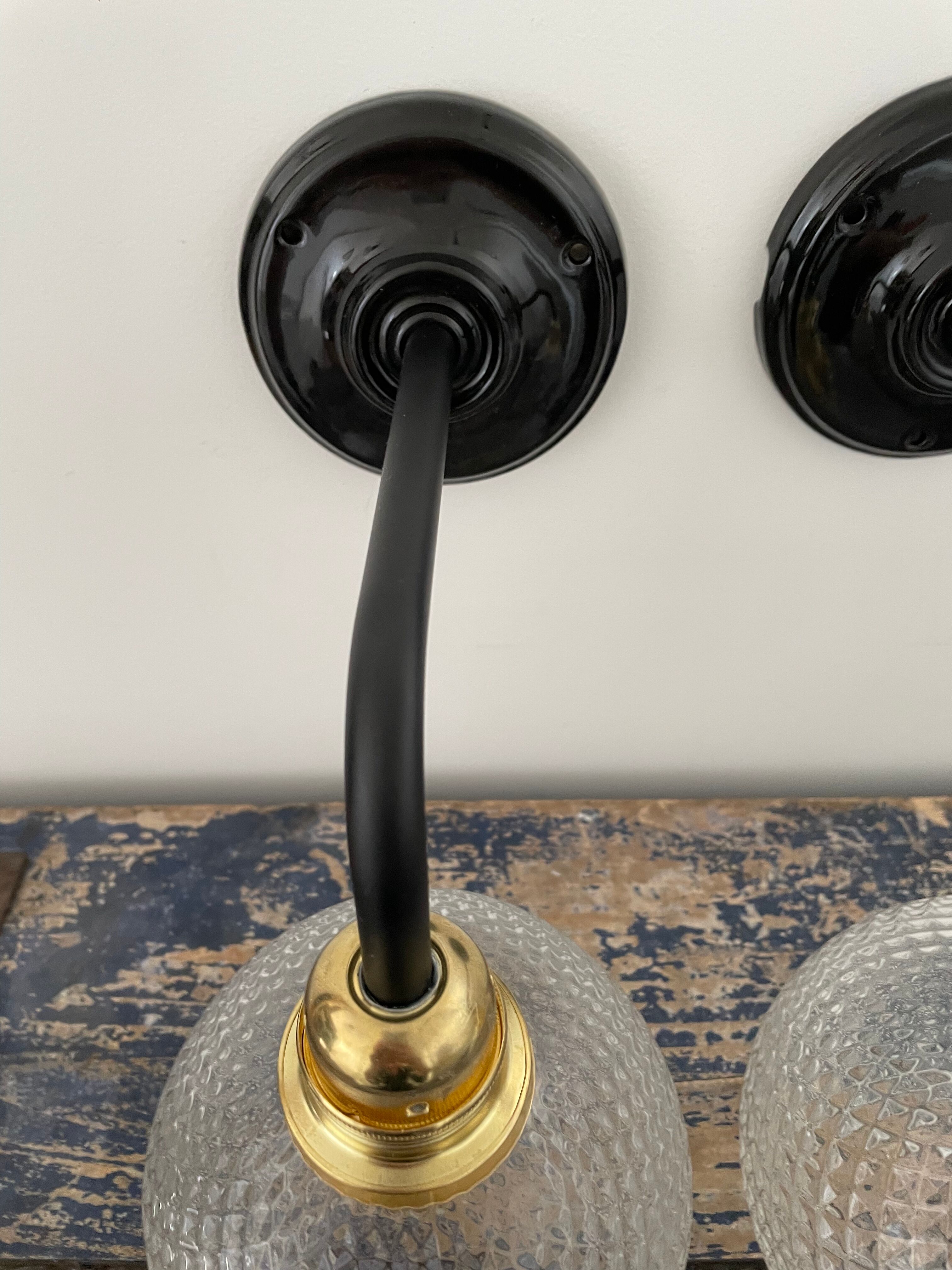 Set of two vintage electrified electrified glass wall lamps