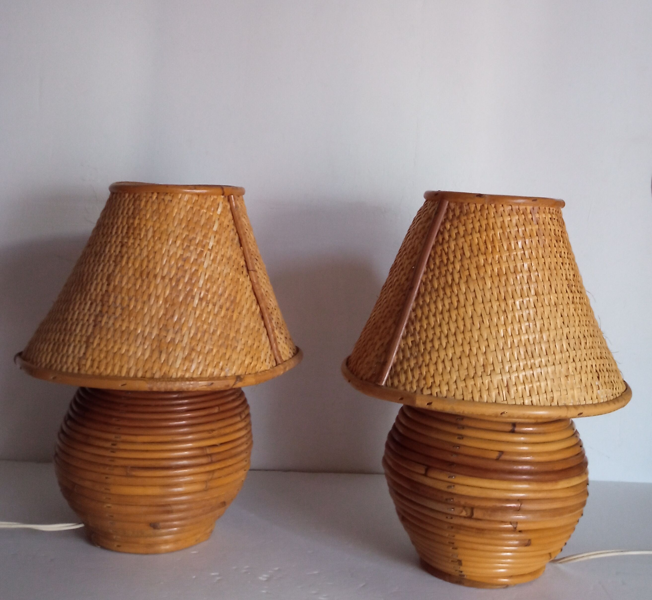 Pair of bamboo lamps and cannage