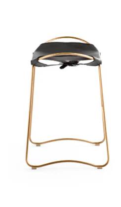 Contemporary kitchen bar stool in aged brass metal and tan leather.