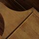 Wood cutting board with groove and handle