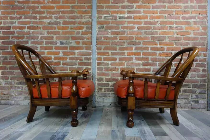 Pair of 60s armchairs in leather and wood