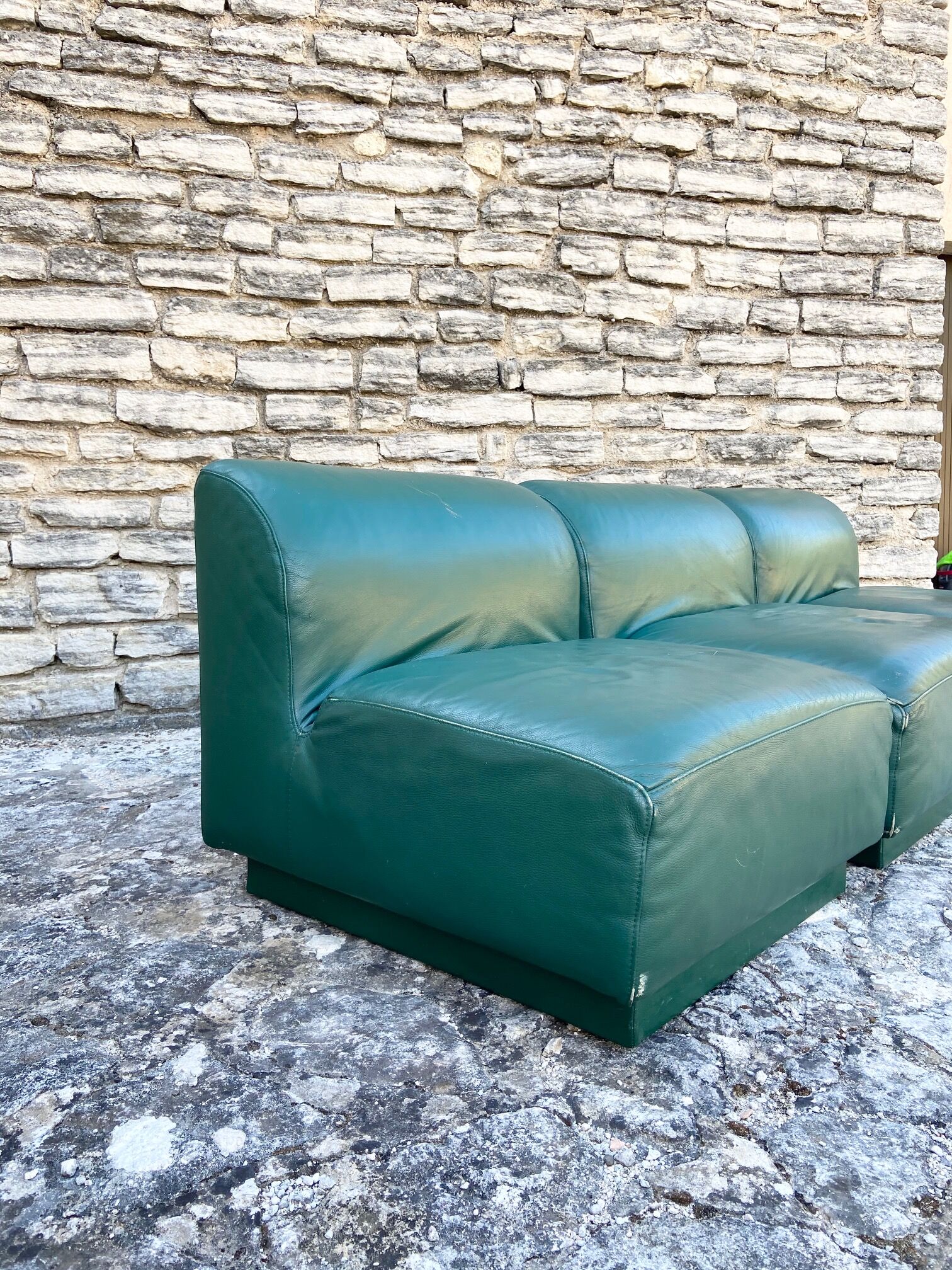 Green leather armchairs