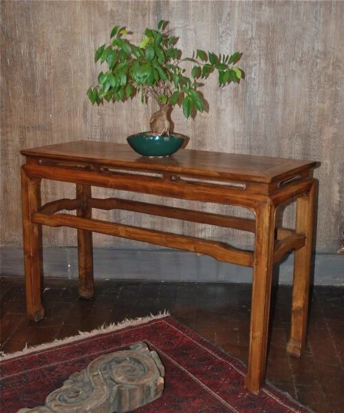 Old Chinese console with lacquer finish.