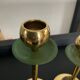 Trio of vintage brass candlesticks