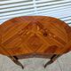 Louis XV style rosewood marquetry table