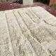 Moroccan Berber rug in ecru 300x200 cm, handmade rug with geometric design.