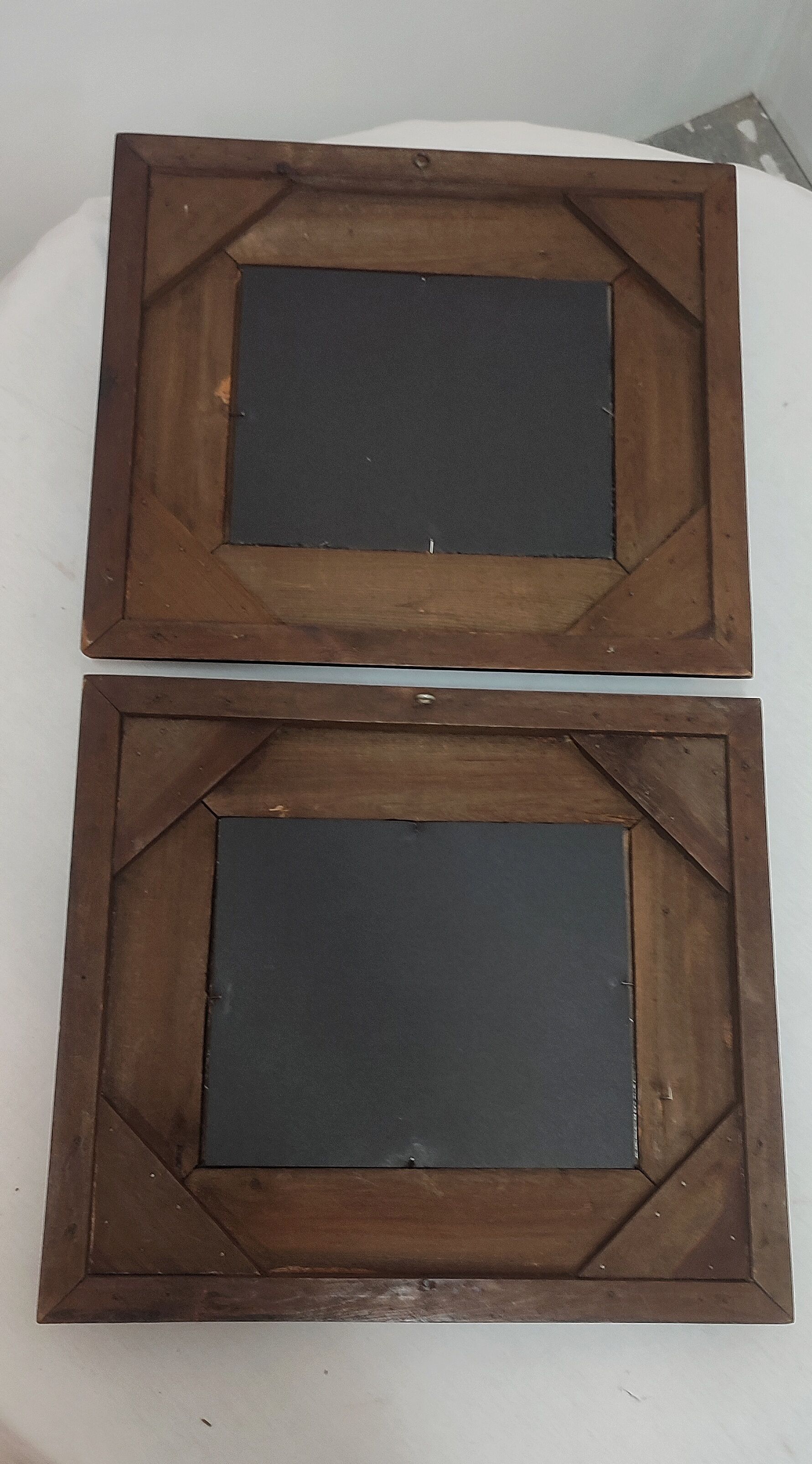Pair of oils on cardboard with carved wooden frame. Spain 1950s.