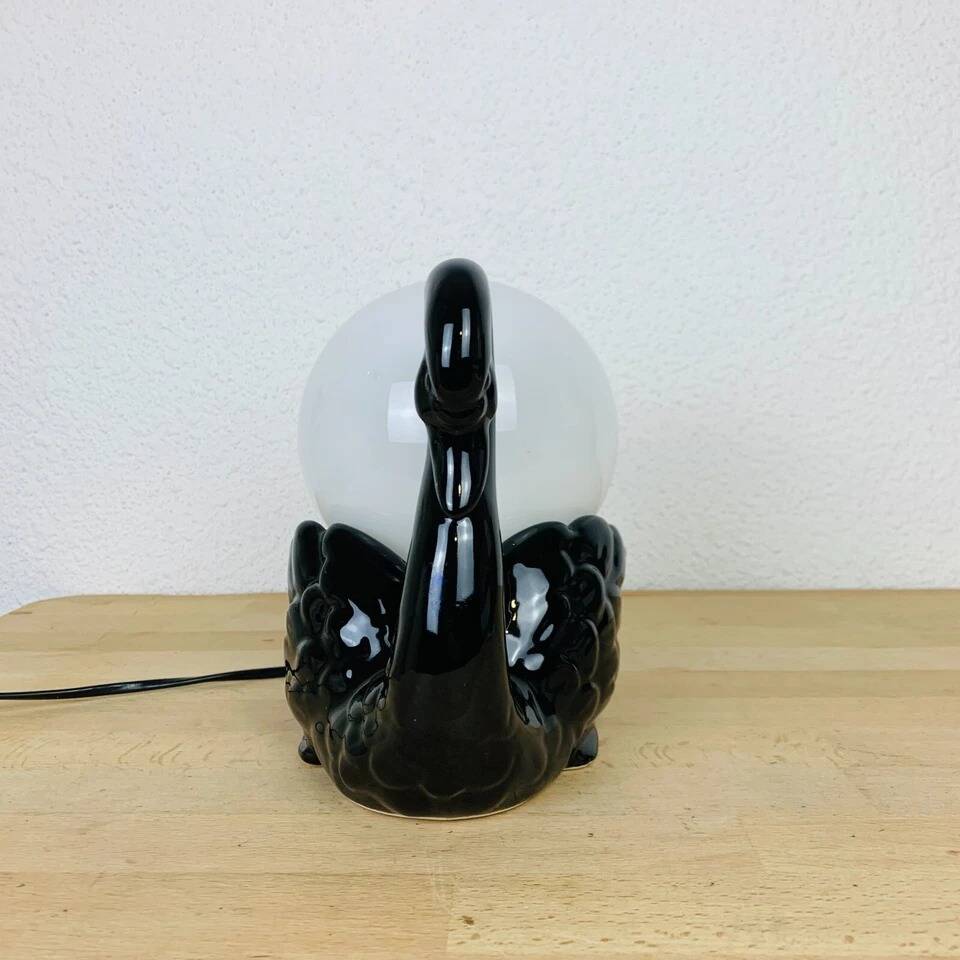 Black ceramic swan lamp with vintage opaline globe