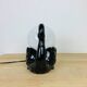 Black ceramic swan lamp with vintage opaline globe
