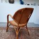 Pair of armchairs in braided rattan 70s