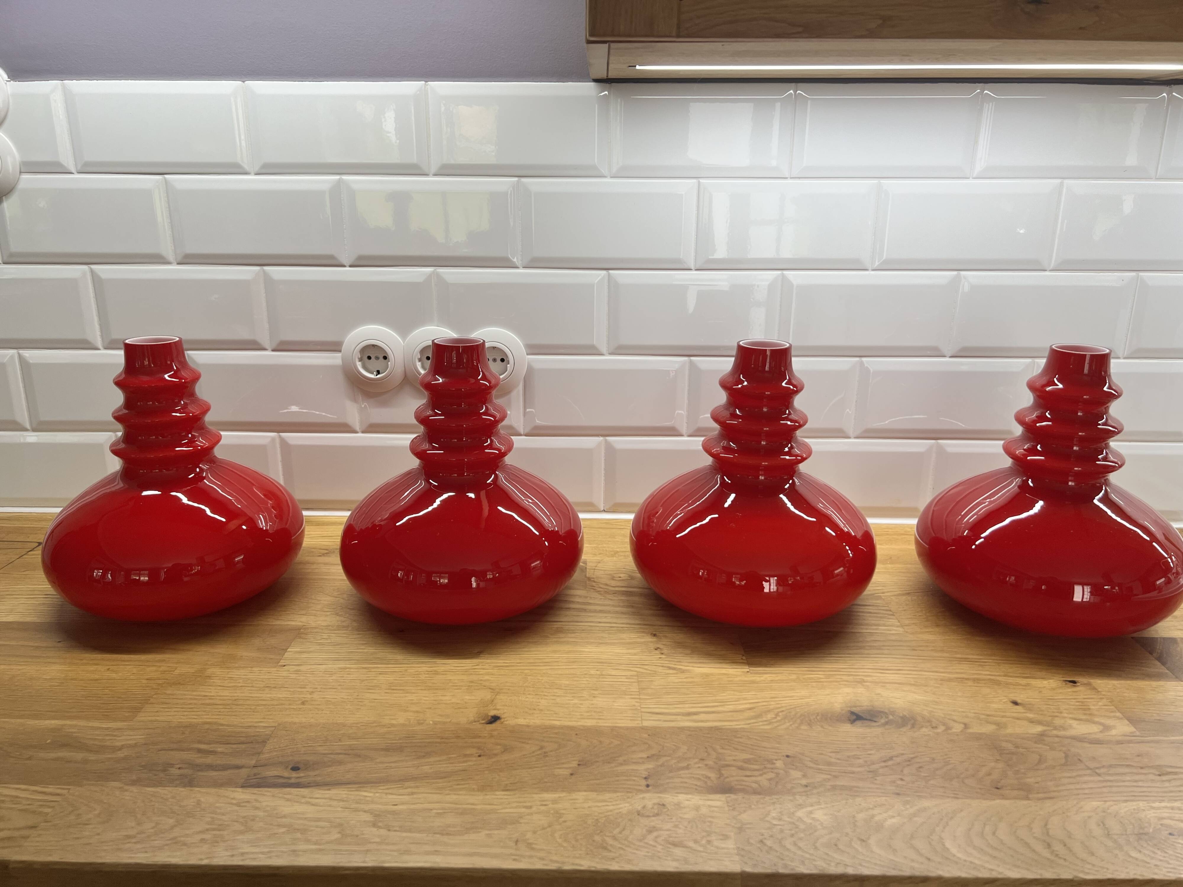 Rare set of 4 red glass pendants from the mid-century by Peill & Putzler (1970s)