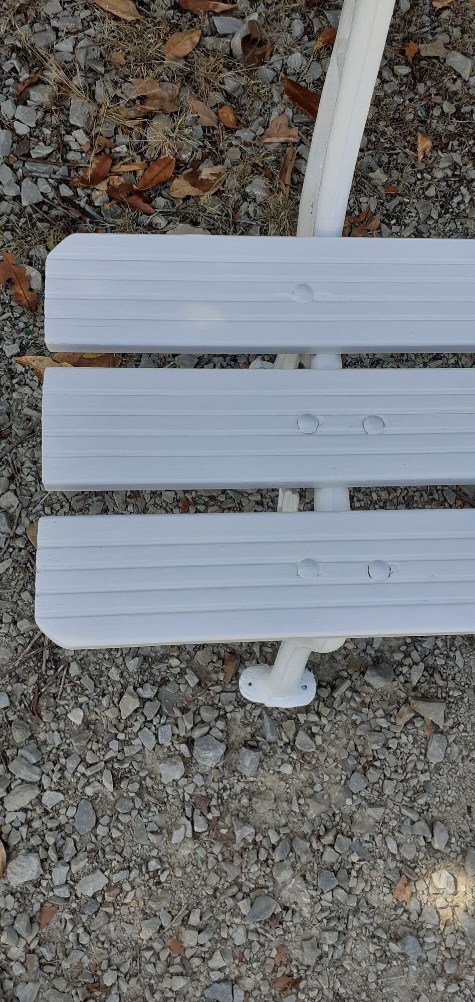 Old white garden bench cast iron feet 19th century