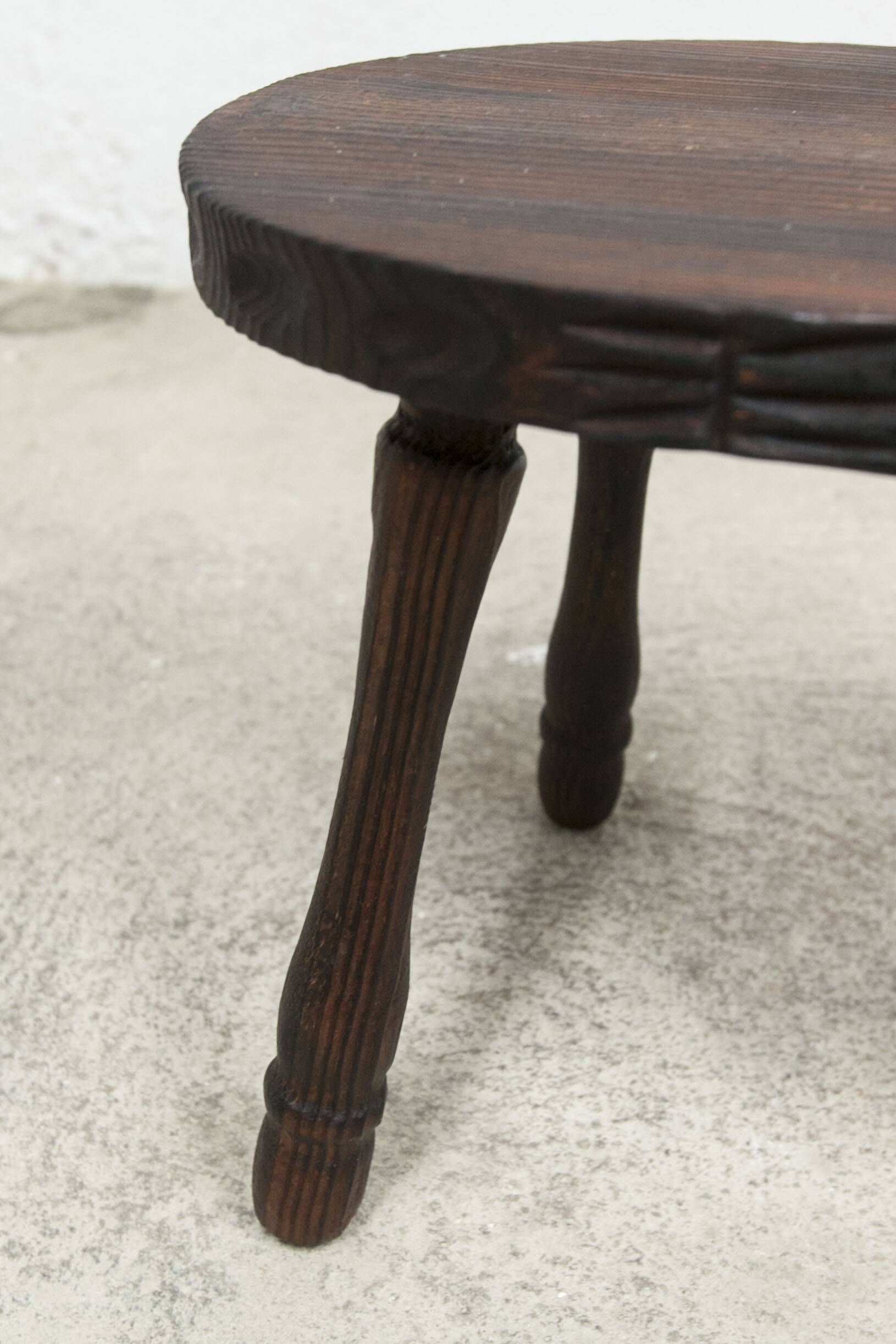 Low brutalist solid wood stool 1950