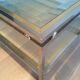 Table basse à double plateau en chrome et laiton