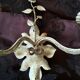 White glazed metal wall light with leaf and flower decor, 2 lights