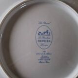 4 assiettes plates "Les Pivoines" en porcelaine de Limoges pour la maison Hermès, Paris
