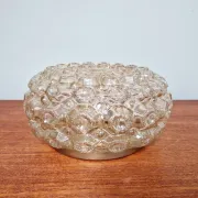Amber glass honeycomb ceiling light, design by Helena Tynell, 1970.