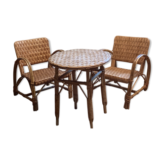 Ensemble de deux fauteuils et table en osier et rotin
