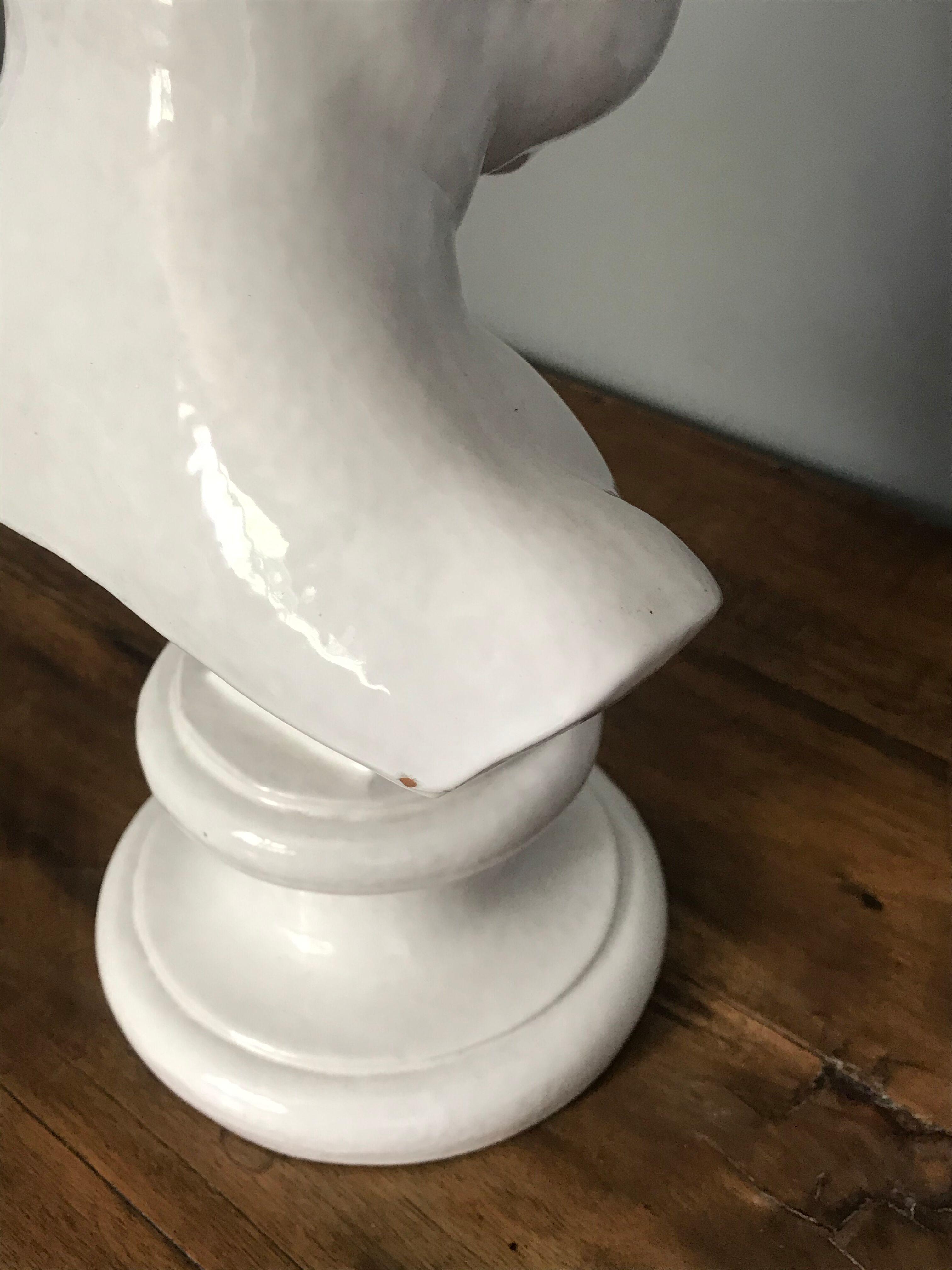 Child bust in enamelled terracotta