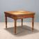 Antique extendable table in oak, walnut, and poplar, Europe, 19th century.