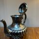 Silver-plated metal teapot