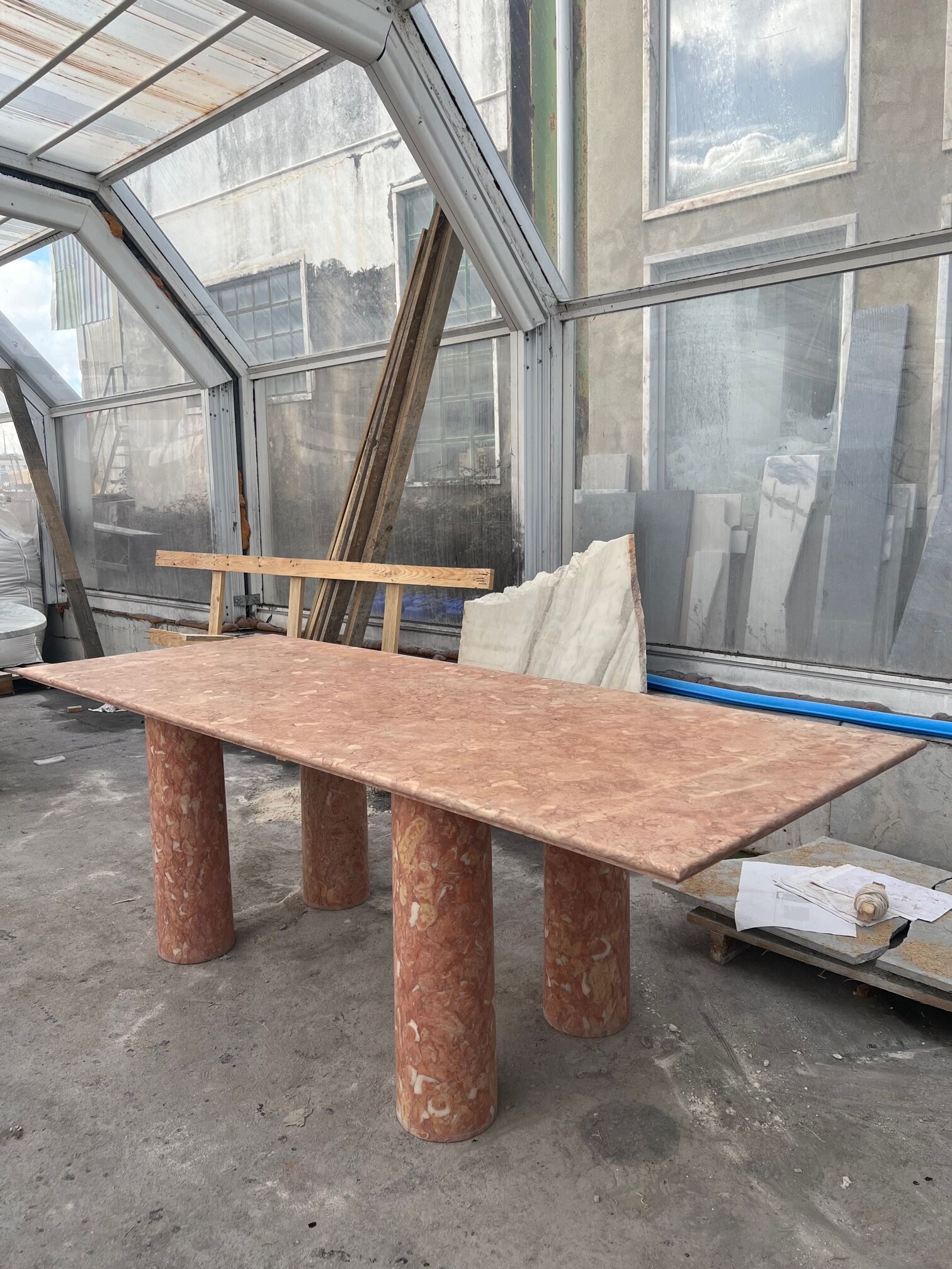 Large rectangle stone dining table in red/pink Portuguese Travertine