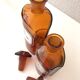 Paire de bouteilles de pharmacie vintage