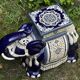 Elephant stool in glazed ceramic in cobalt blue and ivory colors