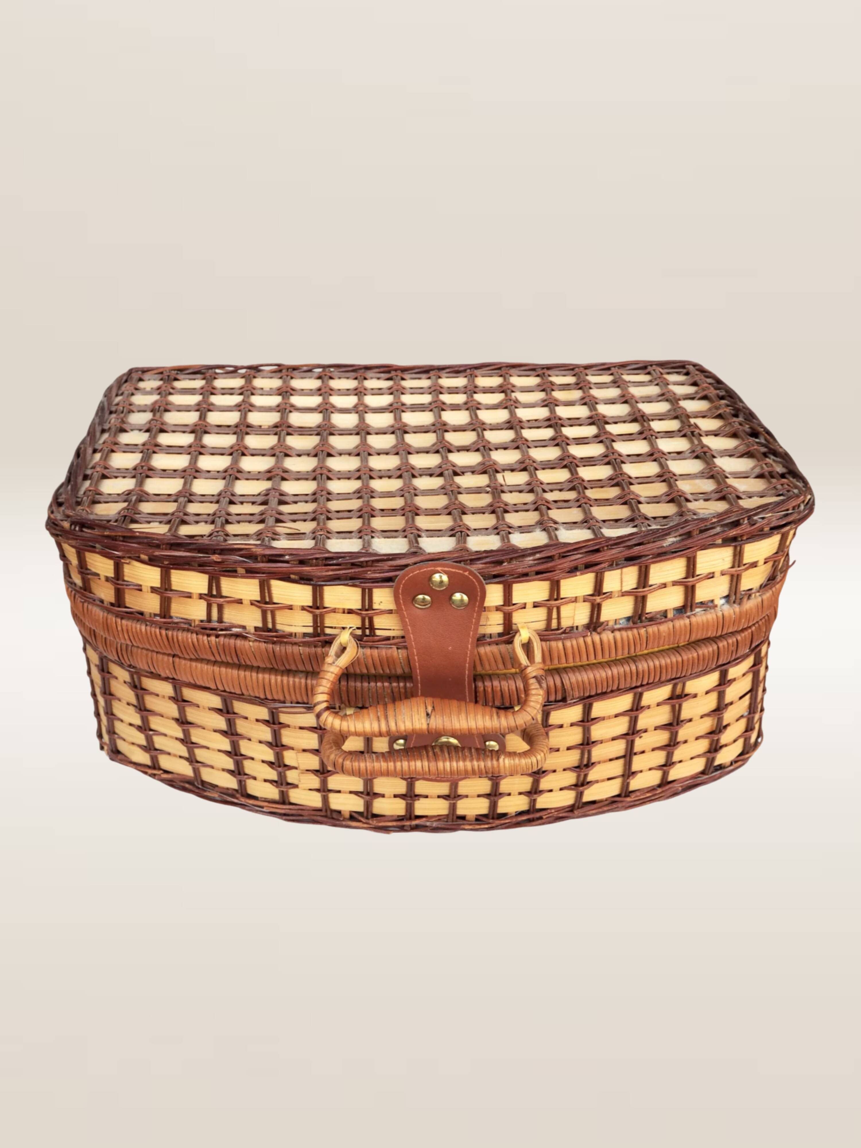 Wicker picnic basket, blue gingham interior.