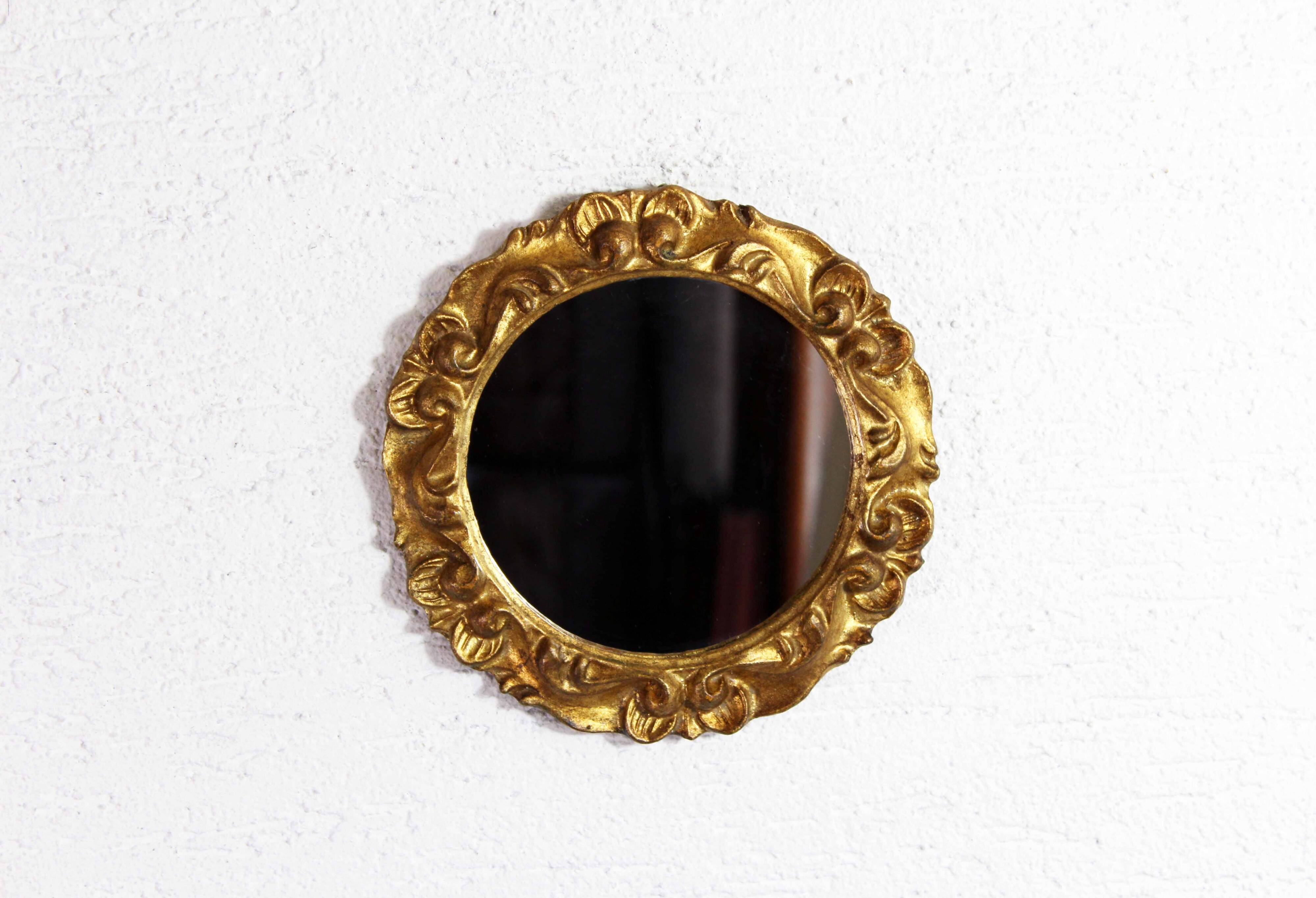 Round gold leaf mirror
