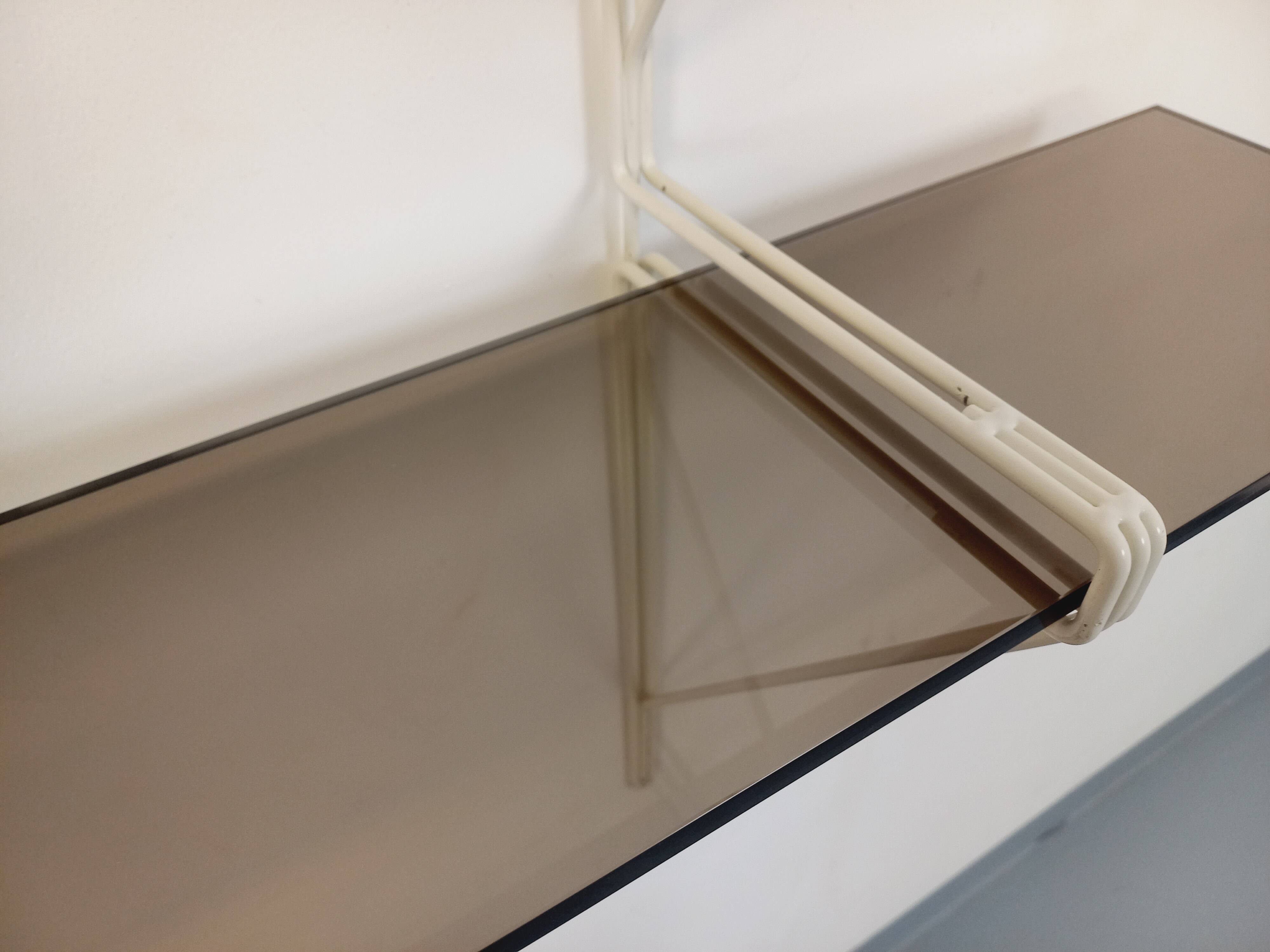Large vintage wall shelf in smoked glass and white metal in String style.