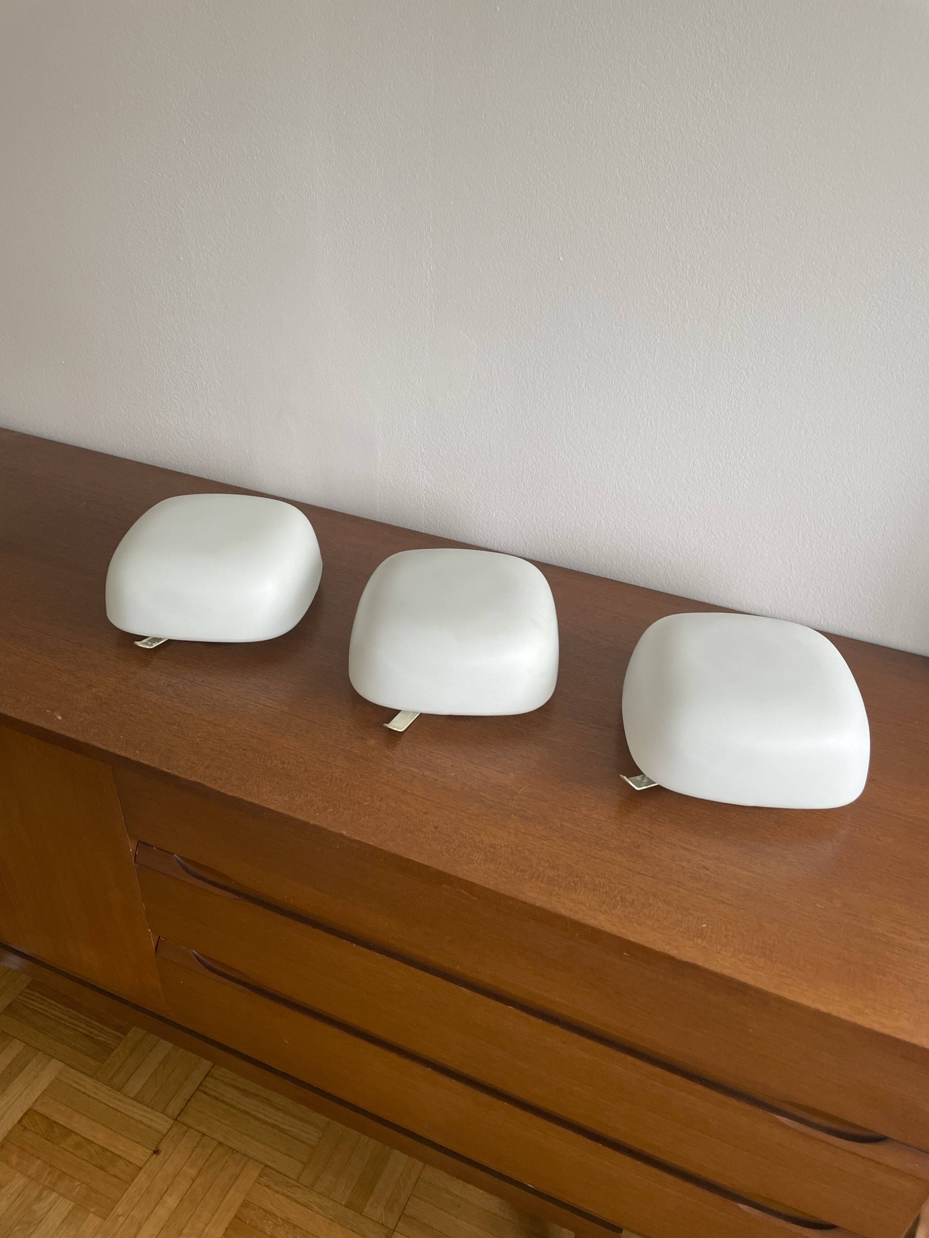 Square wall lights in sandblasted white glass