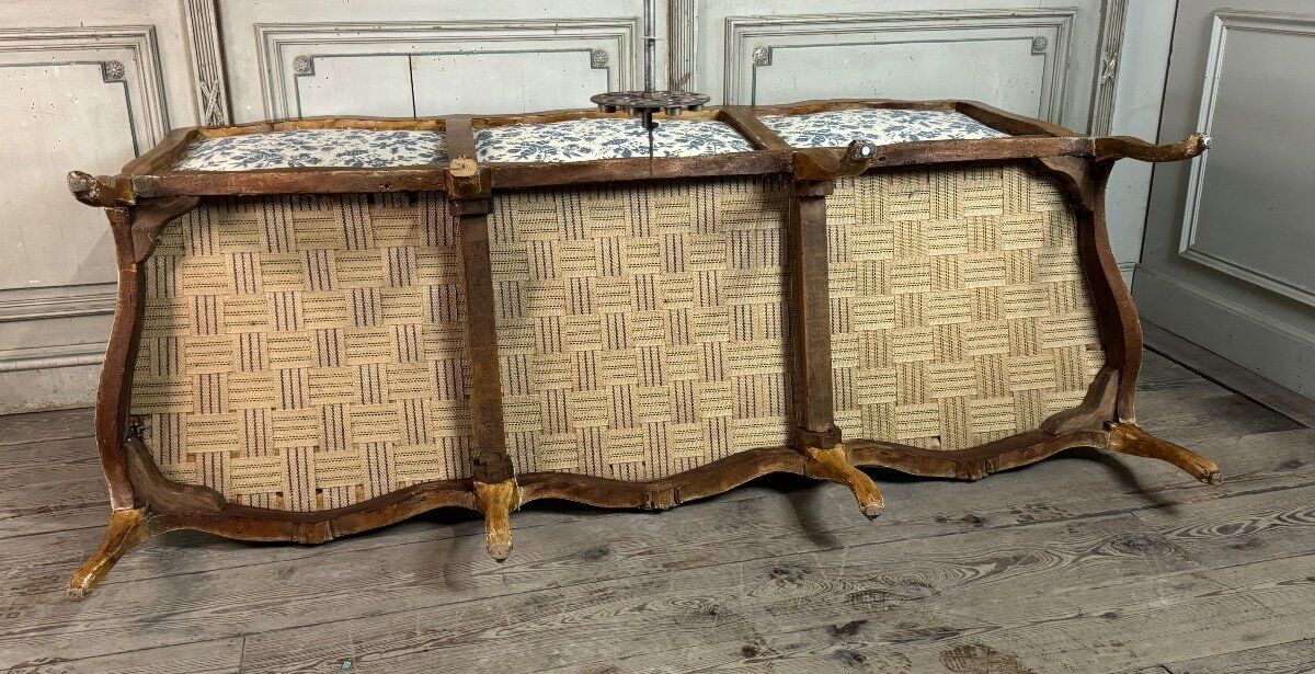 Louis XV bench in carved wood with oak patina, 18th century