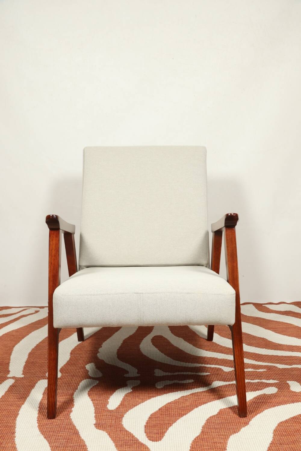 Vintage light gray armchair dark wood Scandinavian design 1970