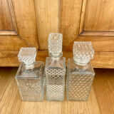 Set of 3 vintage whisky carafe bottles in molded glass