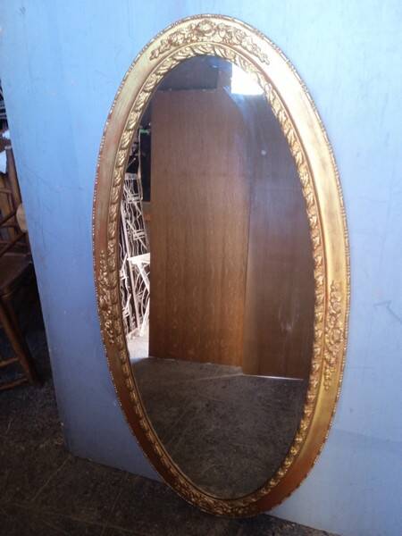 Oval mirror 134cm wood and gilded stucco early 20th century