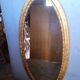 Miroir ovale 134cm bois et stuc doré debut XXem