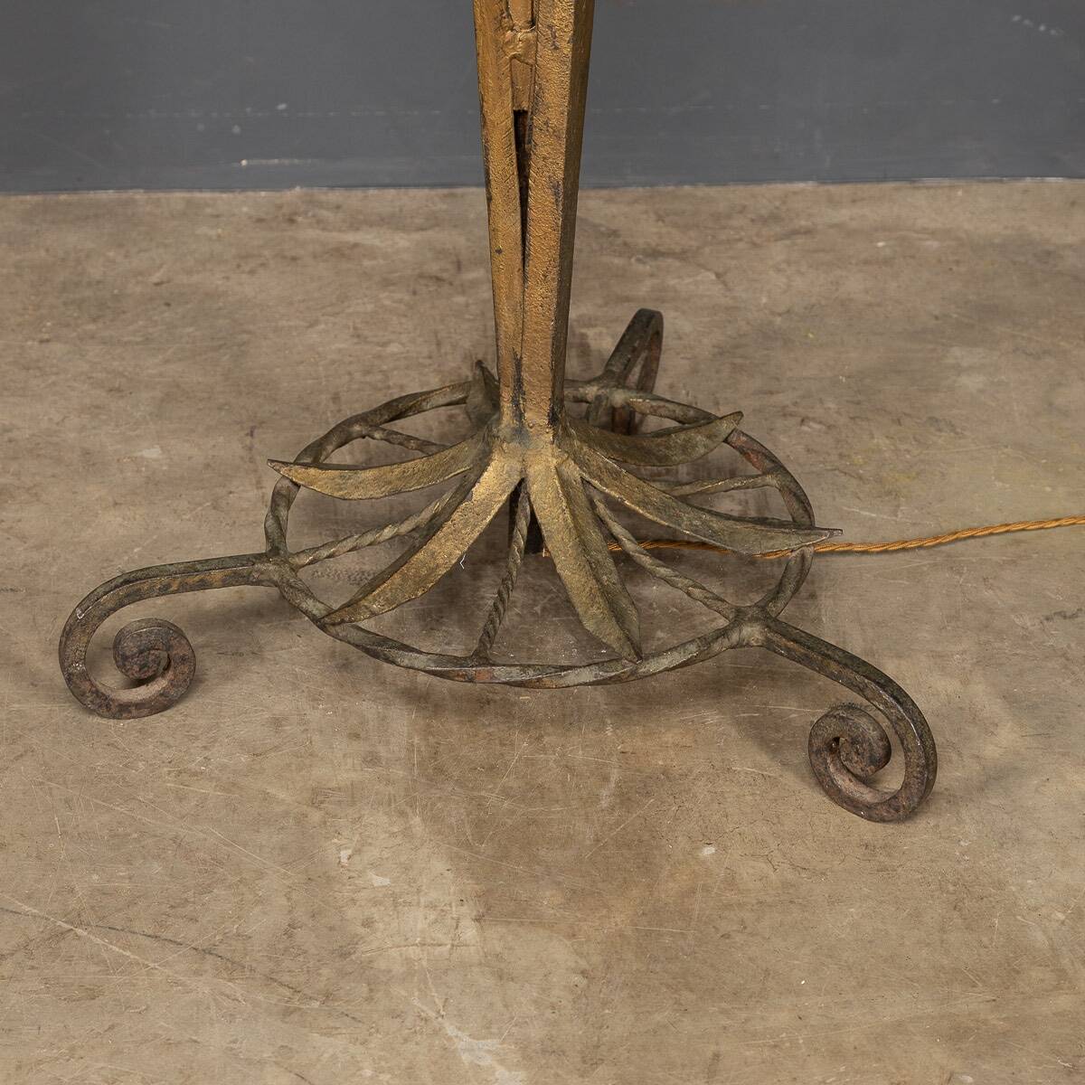 A french gilt wrought iron floor lamp, attributed to maison bagues c.1970