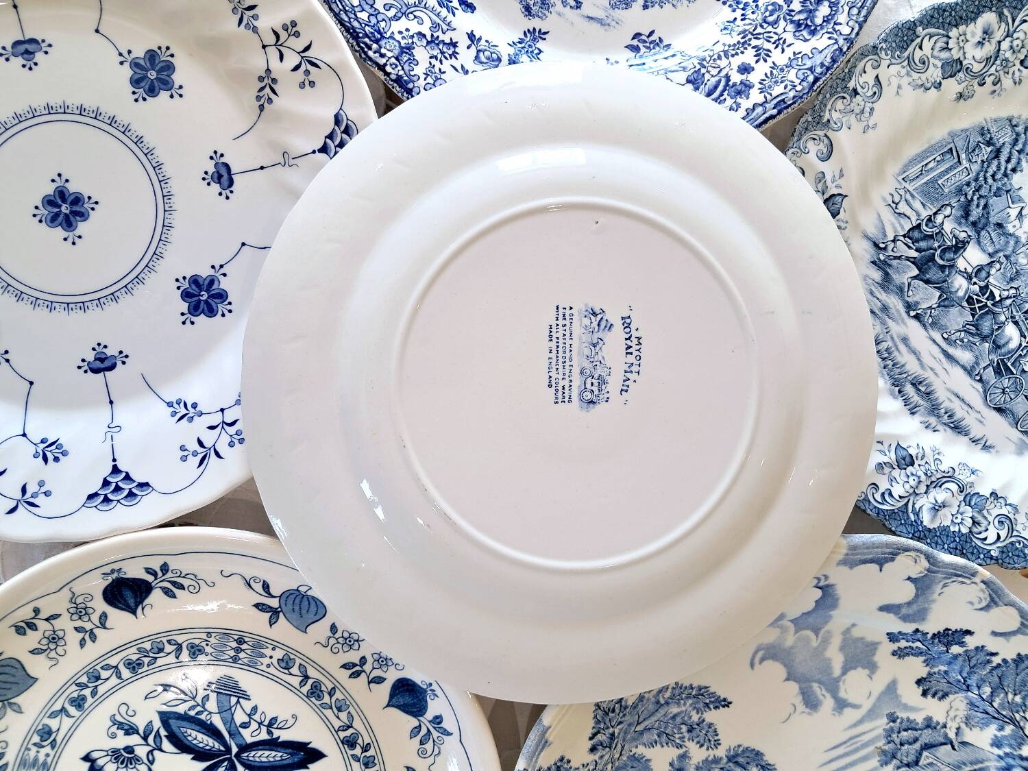 Mismatched antique dinner plates