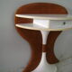 White lasked wood console and 1980s skai background