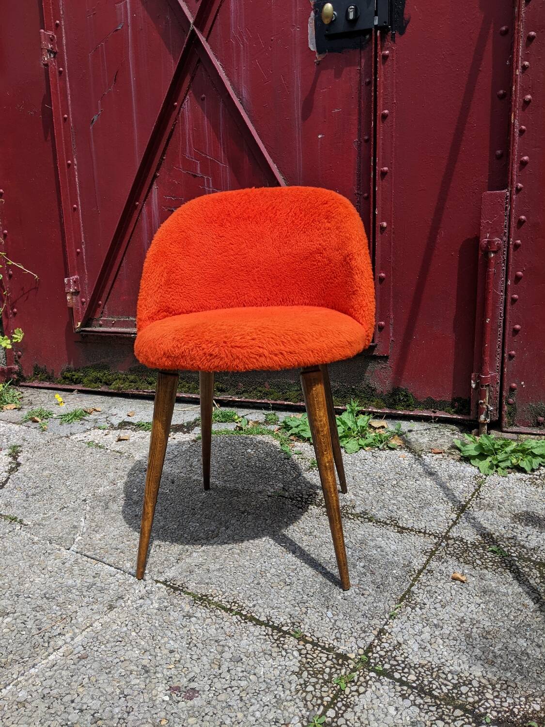 Orange furry barrel chair