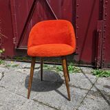 Orange furry barrel chair