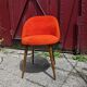 Orange furry barrel chair