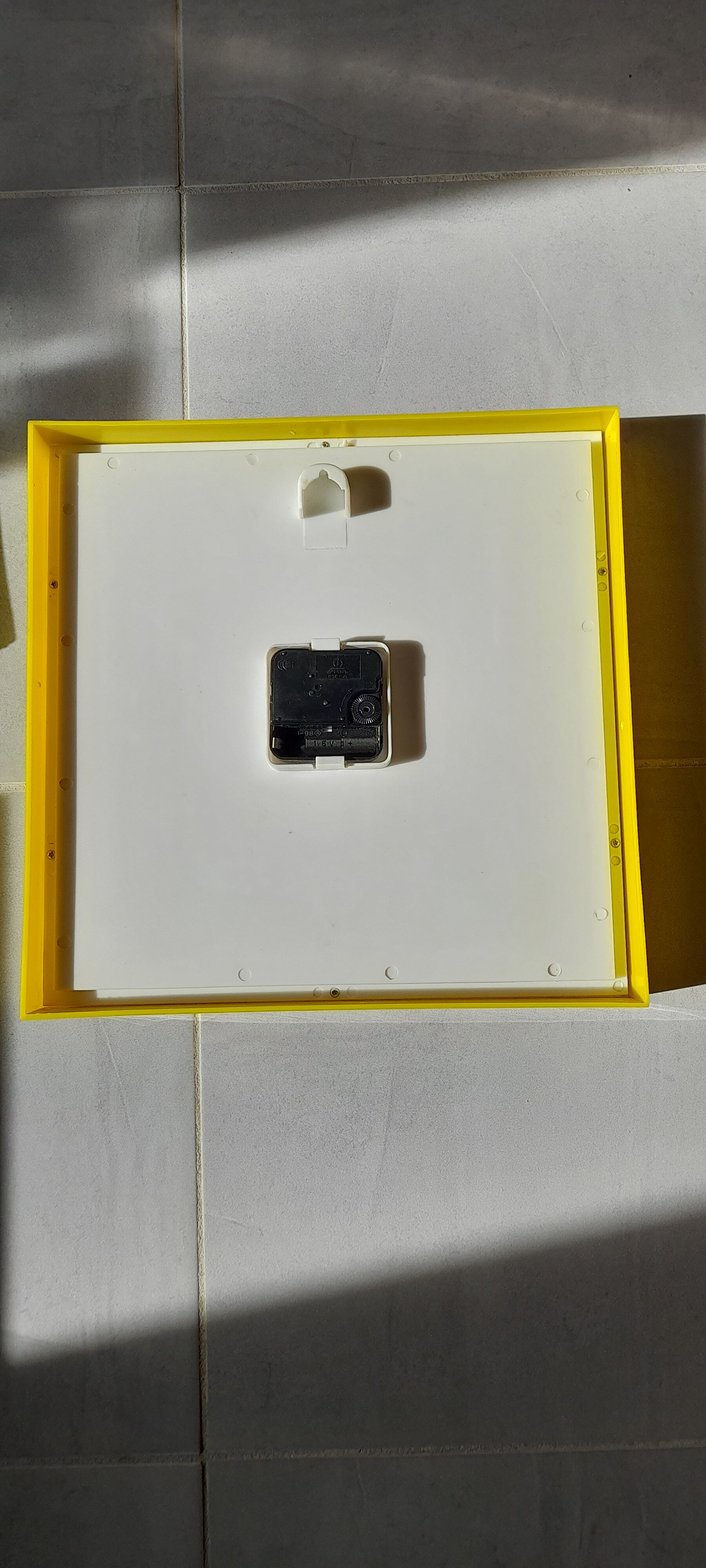 Vintage yellow plastic clock 70s