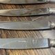 Set of 12 silver-plated metal knives, shell model, from CAILAR BAYARD