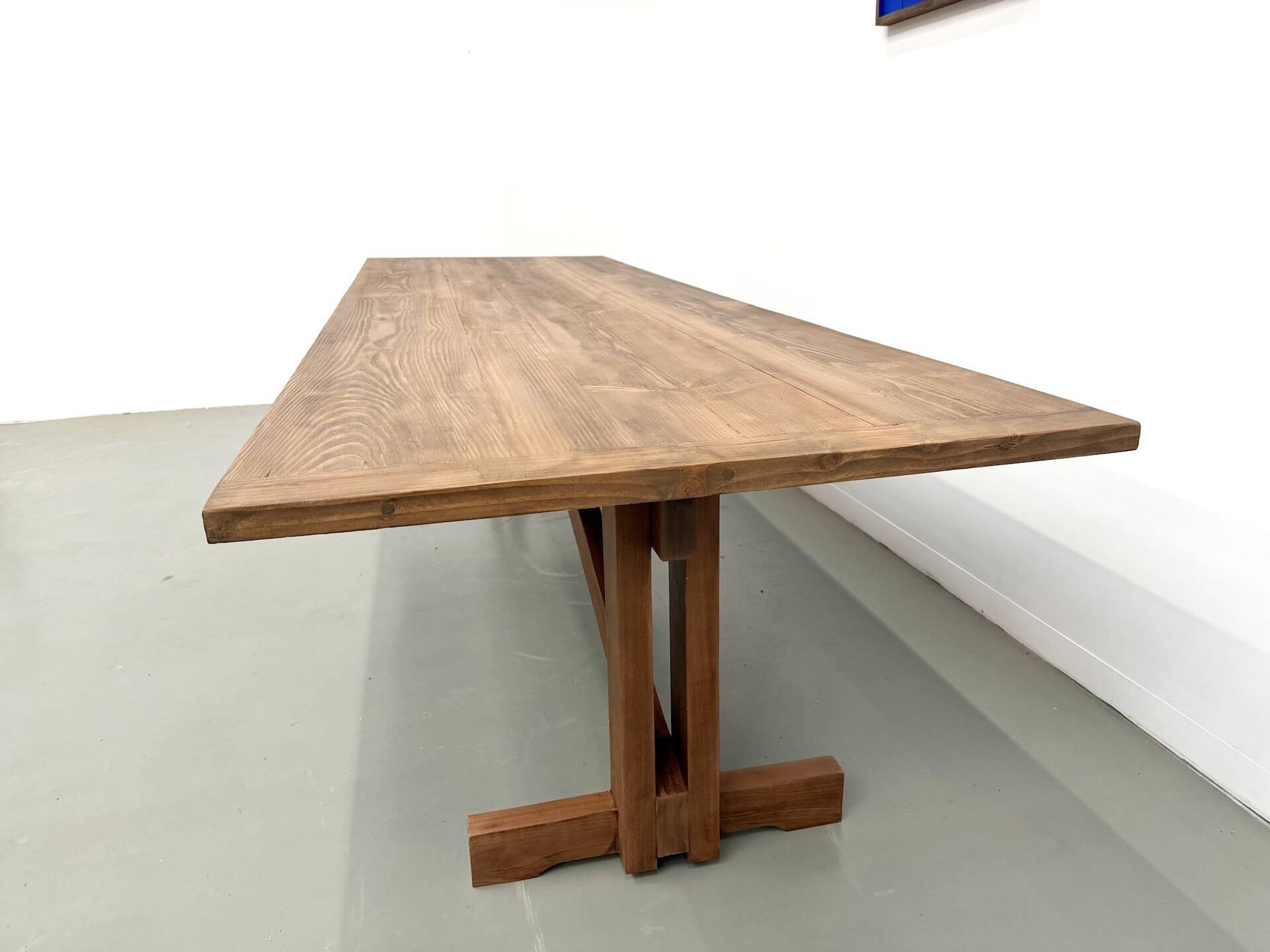 Refectory table in solid pine and beech, with X-shaped legs.