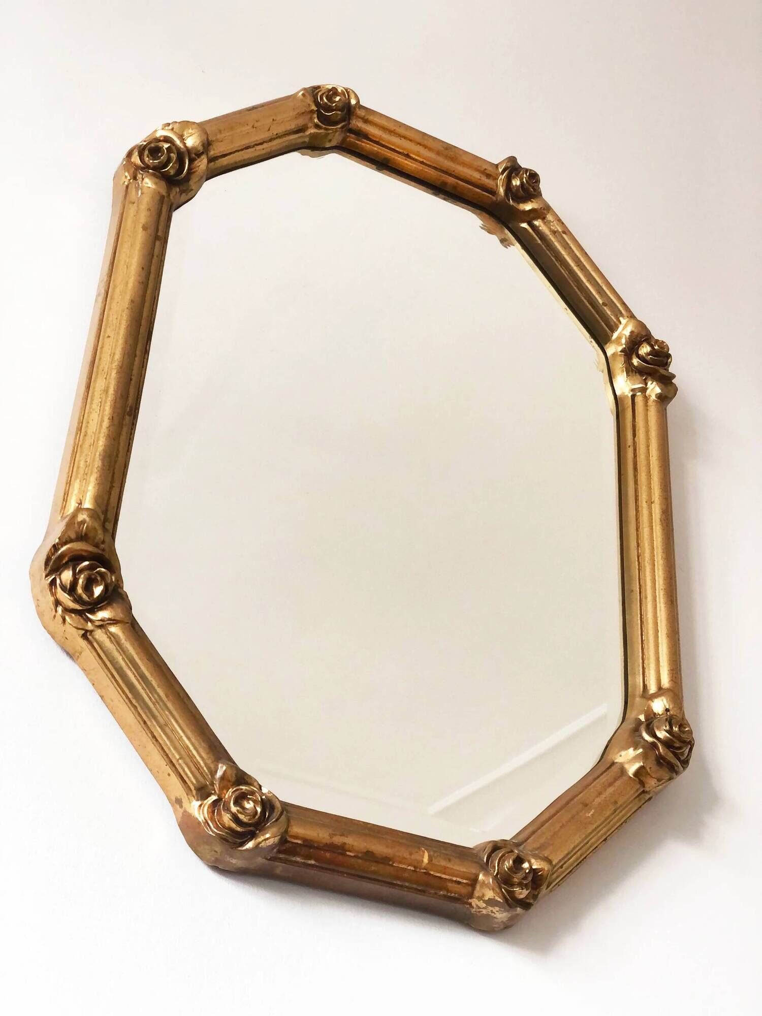 Vintage octagonal giltwood bevelled mirror with rose accents