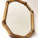 Vintage octagonal giltwood bevelled mirror with rose accents
