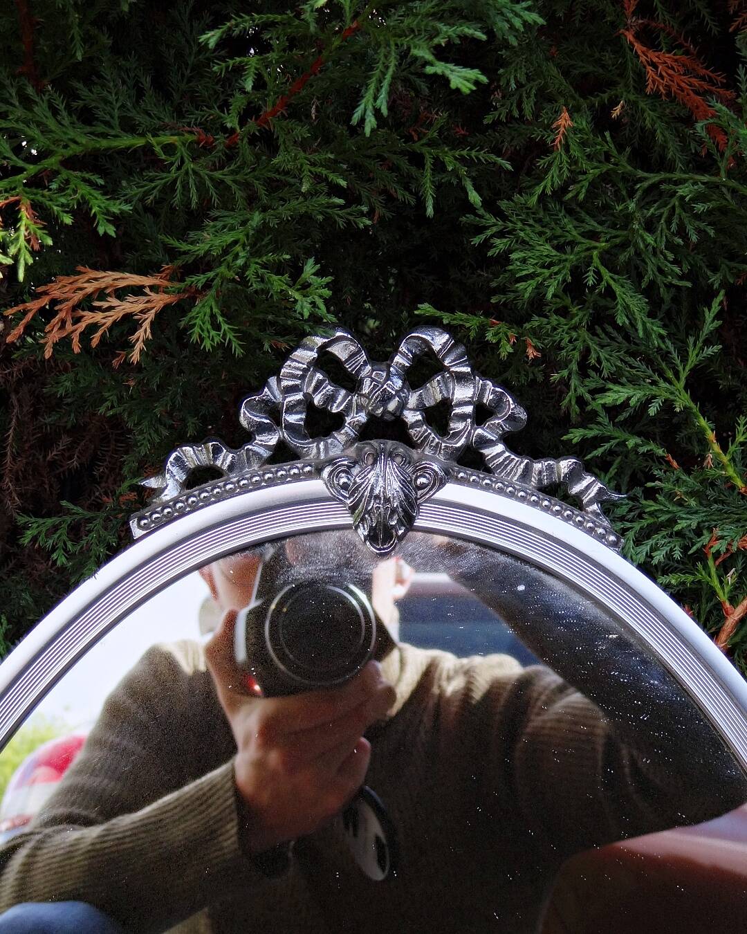 Oval mirror 66x37 Louis XVI style knot in vintage silver metal from the 70s